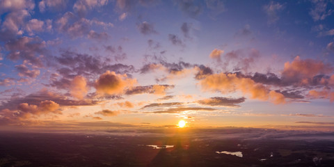 Obraz na płótnie Canvas Beautiful sky at sunset. Drone shooting