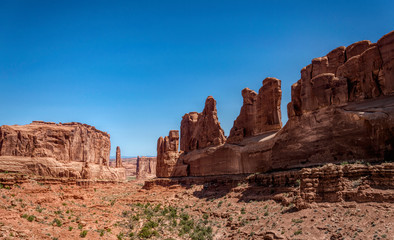 Fototapeta premium Hot stone desert of Utah, USA. Valley in Arches National Park