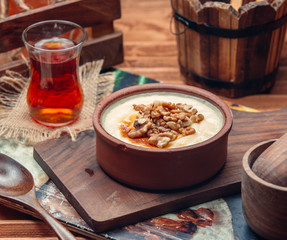 porridge is decorated nuts and honey in the bowl