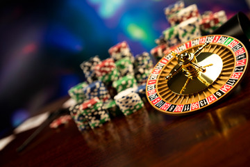 Casino theme. Gambling games. Closeup of the roulette wheel.