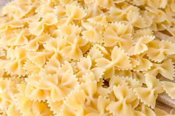 some farfalle pasta forming a background pattern