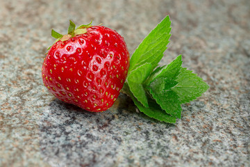 One strawberry with mint