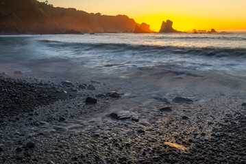 Playa del Silencio beach at sunset, Cudillero in Asturias, Spain