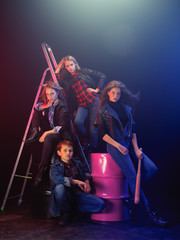 Rebel youth. Full length portrait of cocky children in stylish jeans and leather clothes. Concept...