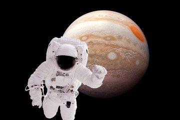 Astronaut in orbit of the planet Jupiter. Elements of this image were furnished by NASA.