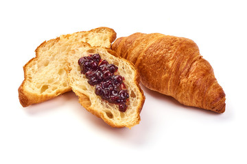 Freshly baked croissants with jam, isolated on white background