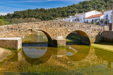 Ancient Roman bridge in the town of San Nicolas del Puerto, Seville. Andalusia, Spain