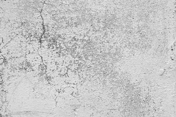 Texture of a concrete wall with cracks and scratches which can be used as a background