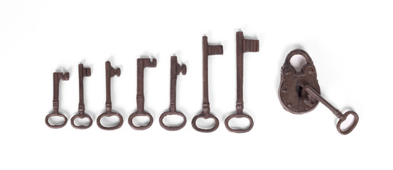 Rusty old lock isolated on white