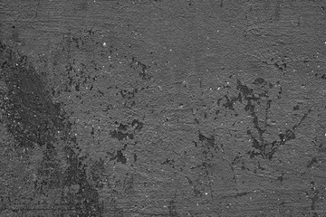 Texture of a concrete wall with cracks and scratches which can be used as a background