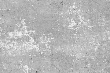 Texture of a concrete wall with cracks and scratches which can be used as a background