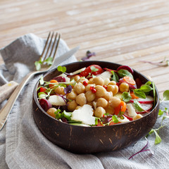 Chickpea salad with vegetables and microgreens