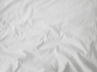 Soft white wrinkled fabric background