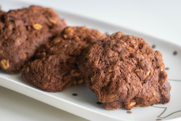 Oat cookies on white plate.