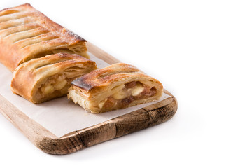 Traditional homemade apple strudel slice isolated on white background. Copy space
