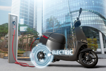 Electric scooter for sharing with charging station on a city street	