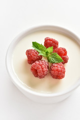 Panna cotta with fresh raspberries