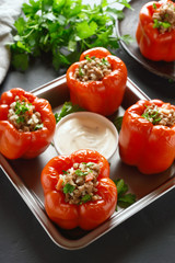 Stuffed red peppers with minced meat, rice, onion