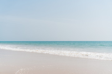 Fototapeta na wymiar ocean landscape and footprints in the sand