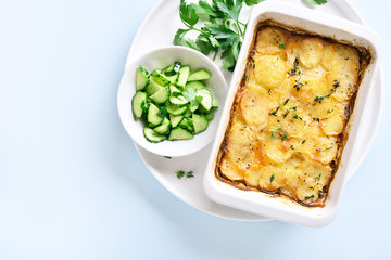 Potato gratin in baking dish