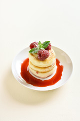 Cottage cheese pancakes with fresh raspberries