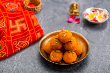 Motichoor Ladoo or Laddu - made from fine bundi, ball shaped sweets popular in indian subcontinent cooked with sugar, ghee or oil