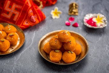 Motichoor Ladoo or Laddu - made from fine bundi, ball shaped sweets popular in indian subcontinent cooked with sugar, ghee or oil