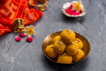 Motichoor Ladoo or Laddu - made from fine bundi, ball shaped sweets popular in indian subcontinent cooked with sugar, ghee or oil