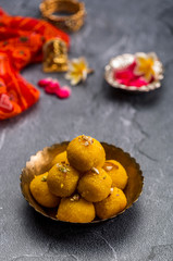 Motichoor Ladoo or Laddu - made from fine bundi, ball shaped sweets popular in indian subcontinent cooked with sugar, ghee or oil