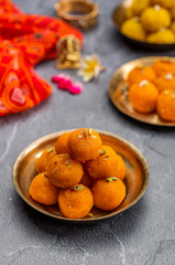 Motichoor Ladoo or Laddu - made from fine bundi, ball shaped sweets popular in indian subcontinent cooked with sugar, ghee or oil