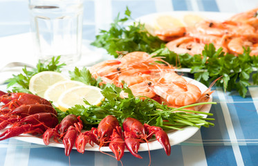 cooked shrimp and crayfish on plate close up