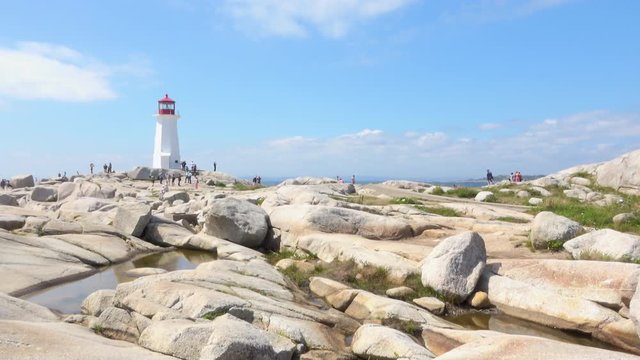 4K Travel Beautiful Lighthouse On Rocky Coastline