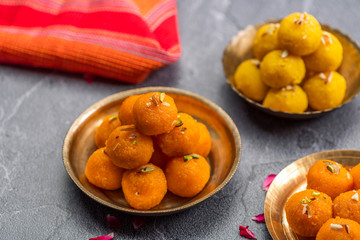 Motichoor Ladoo or Laddu - made from fine bundi, ball shaped sweets popular in indian subcontinent cooked with sugar, ghee or oil