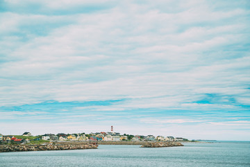 Alnesgard, Godoya, Norway. Old Alnes Lighthouse In Summer Day In Godoy Island Near Alesund Town. Alnes Fyr