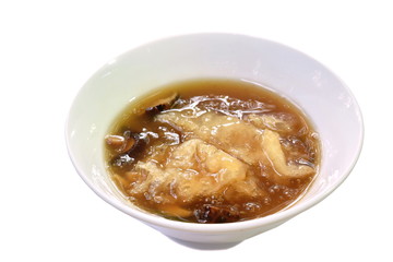  braised fish maw and mushroom in red gravy on bowl 