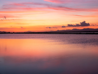 orange sunset on salty lake in Santa Pola