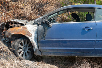 The driver of the blue car lost control. Engine compartment fire.