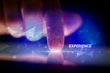 Finger touching tablet with EXPERIENCE inscription, business concept