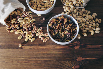 selection of varied nuts and dried fruit in bowls