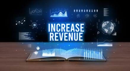 INCREASE REVENUE inscription coming out from an open book, creative business concept