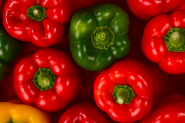 Fresh red, green, yellow bell pepper background.