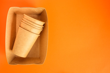 cutlery wooden, craft paper (eco friendly forks, plates, biodegradable materials) food containers eco packaging, menu concept. food background. copy space