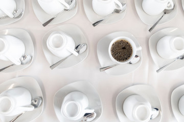 Coffee cups at a catered buffet table
