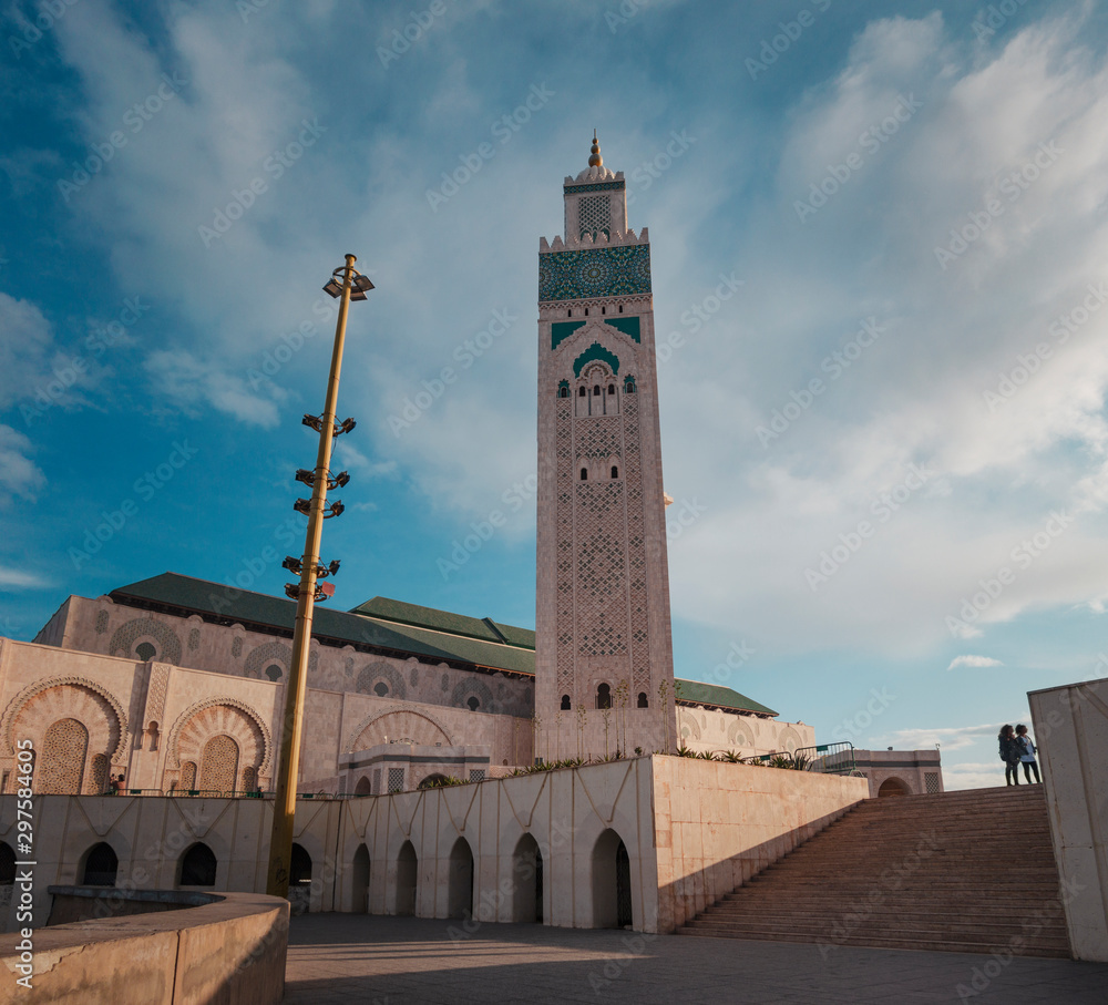 Wall mural low angle view of hassan ii mosque against sky