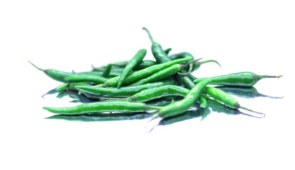 Fresh green chilli on white background
