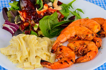 Peel and Eat Shrimp served with Salad and Pasta