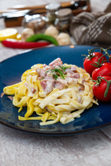 tasty Carbonara pasta on the table