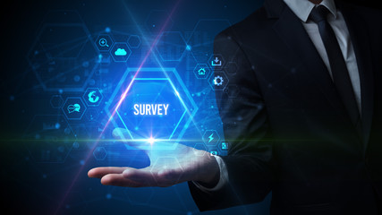Man hand holding SURVEY inscription, social media concept