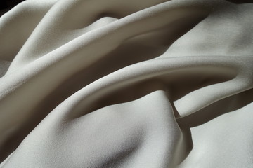 Light grey chiffon fabric in soft folds
