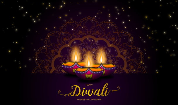 Diwali or Festival of Lights with fancy clay lamps and mandala